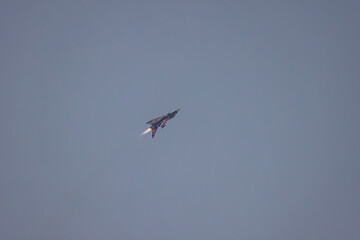 Fighter jet in a flight - sortie run with after burners