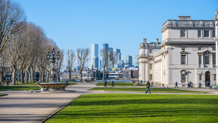 Visitors stroll through the beautifully landscaped grounds of the Old Royal Naval College in...