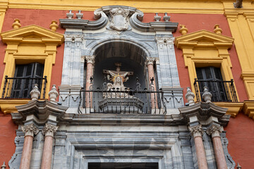Ornate Baroque Facade with Religious Statue on Episcopal Palace, Malaga