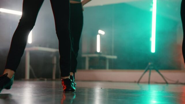 Young girls in a stylish studio doing a tap dance routine