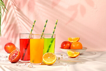 Orange juice, thick smoothie and oranges, grapefruit, lime, blood orange and lemon on elegant...