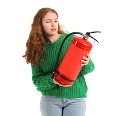 Young woman with fire extinguisher on white background