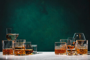 Strong hard alcoholic drinks, spirits, liqueurs, distillates, whiskey and others. Drink background...