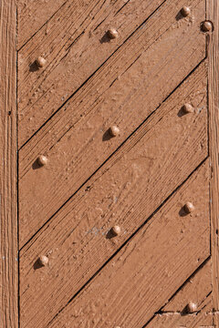 Visually appealing painted wooden door with iron fastners found within the wall of Fort Gaines on Dauphin Island Alabama