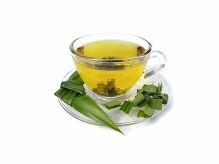 Pandan leaf tea or pandan leaf boiled water in glass isolated on white background 