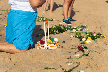People of Candombe are seen participating in the homage to Iemanja on Rio Vermelho beach. City of Salvador, Bahia.