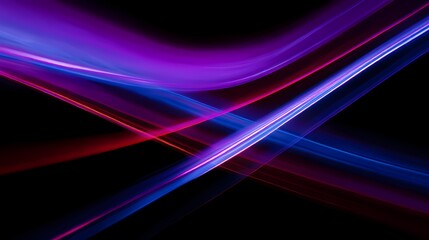 Abstract light trails in vibrant hues of purple, blue, and red dance across a dark background creating a dynamic visual experience.