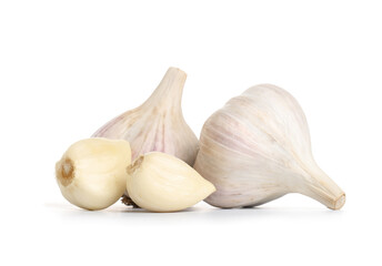 Fresh garlic and cloves on white background