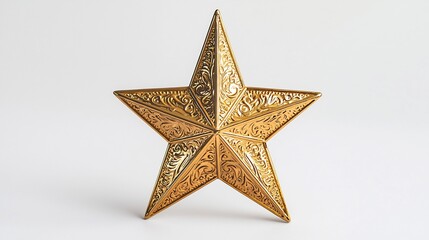 Gleaming golden star tree topper detailed engravings set alone on a white background for a minimalist effect