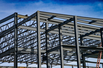 Steel framework assembled for new commercial building under construction.