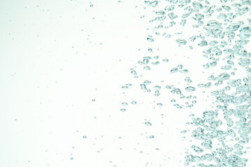 Many water bubbles on light background, closeup. Space for text