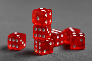 Red game dices on grey background