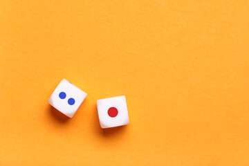 White game dices on orange background