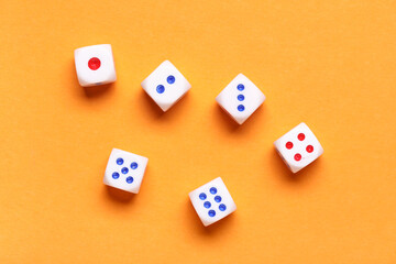 White game dices on orange background