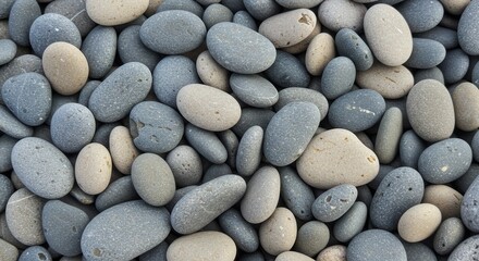 Serene collection of smooth gray and beige beach stones background