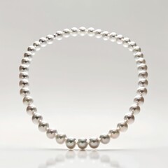 Pearl necklace with soft curve on white background