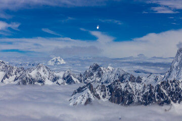 Fototapeta premium Mont Blanc, Monte Bianco mountain summit snow dome above the Chamonix valley in France. Highest peak in Europe in the Alps, alpine scenic view of Montblanc