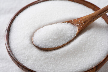 closeup of pure natural salt in a wooden spoon