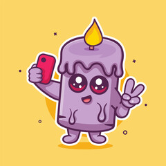 smiling candle character mascot taking a selfie with a smartphone isolated cartoon 