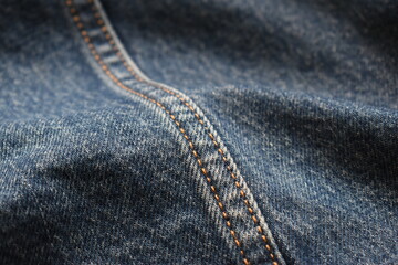 seam of blue denim texture background, jean fashion style