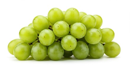 A bunch of fresh green grapes piled together on a white background in a studio setting view close up