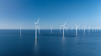 A stunning panorama of offshore wind turbines stands tall in the North Sea, showcasing the Netherlands commitment to sustainable energy.