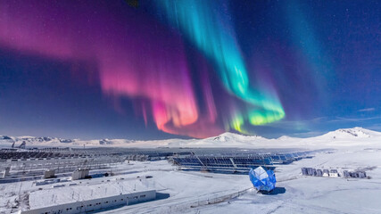 Spectacular Aurora Borealis Illuminates Antarctic Research Facility Scenery