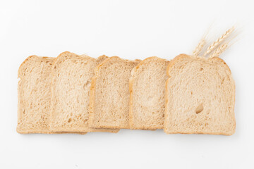 A staple bread made by mixing yeast into flour, kneading it, and baking it.
