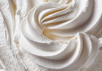 Close-up of soft, creamy white whipped texture.
