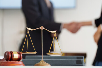 Justice and Legal Balance. A symbolic scale of justice in focus, indicating professionalism during...