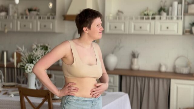 young modern woman suffers from weight loss, nutrition problems, eating disorder, excess weight