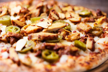 Gyros Pizza with jalapeno pepper and mozzarella cheese. Soft focus. Close up.	