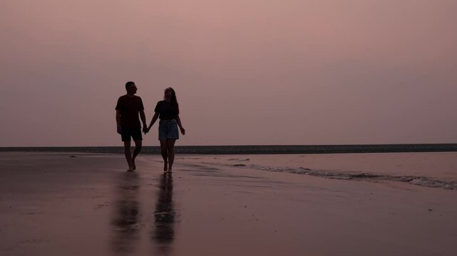 Enjoy a Romantic Sunset Walk on the Beach with a Loved One, creating lasting memories