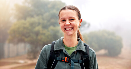 Hiking, portrait and smile with woman in nature for fitness, travel and adventure holiday. Explore, trekking and environment with person outdoor for eco tourism, backpacking and vacation trip