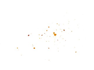 Dried red chili powder flying. Grainy scatterings of spicy burst . Splashes of red pepper powder.Overlay effect chilli or paprika spice splatters.