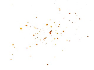 Dried red chili powder flying. Grainy scatterings of spicy burst . Splashes of red pepper powder.Overlay effect chilli or paprika spice splatters.