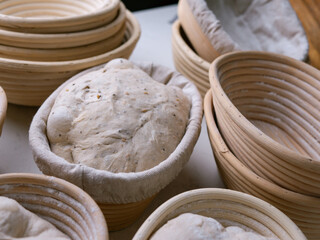 Sourdough Bread in Proofing basket, bannetons baskets for retarding raw dough before baking.