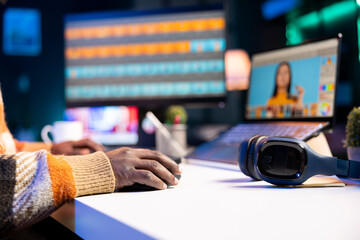 Freelance graphic designer working from home office on editing photos with advanced digital tools, showing the versatility of online work in the creative industry. Digital art retouching.