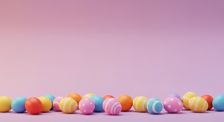 Colorful easter eggs with patterns arranged on a soft gradient pink background for decoration