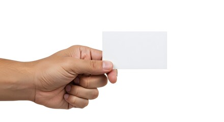 Fototapeta premium Close-up image featuring a hand holding a blank business card against a clean white background, offering ample space for custom designs, text, or branding elements