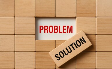 Problem and Solution text on wooden blocks representing problem solving business skill. Solution concept