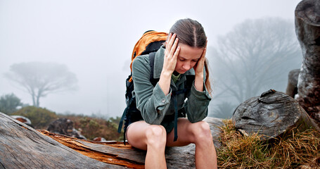 Outdoor, hiker or woman in nature with headache, stress or burnout on adventure and trekking...