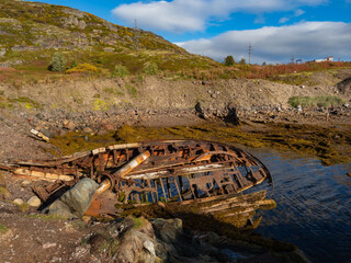 The cemetery of old ships is a landmark in Teriberka, on the Barents Sea in the Murmansk region of...