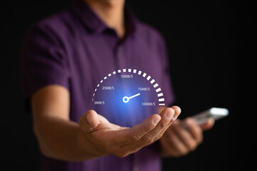 Smartphone speed test held in hand and virtual screen of internet speed measurement. Internet and technology concept. High speed internet concept.