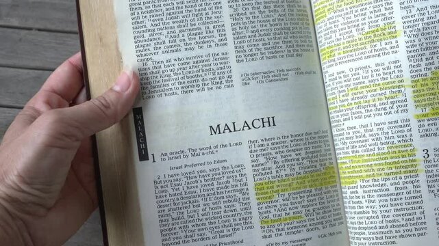 Opening to the book of Malachi in the Old Testament of the Holy Bible.