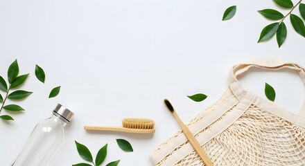 Eco-friendly items like a glass bottle, bamboo toothbrush, natural scrub brush, and reusable cotton bag arranged with green leaves on a white background.