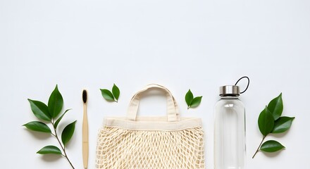 Eco-friendly items like a glass bottle, bamboo toothbrush, natural scrub brush, and reusable cotton bag arranged with green leaves on a white background.