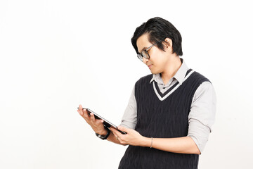Holding and Using Tablet Of Handsome Asian Man Wearing Black Suit Isolated On White Background