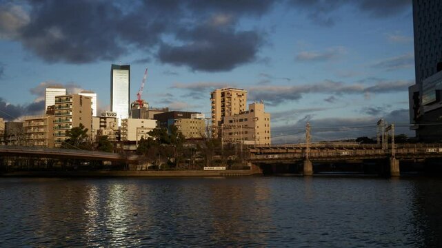 Golden Hour Over Osaka &ndash; Warm Urban Cityscape
