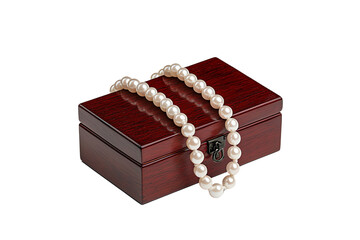 A luxurious strand of pearls elegantly draped over a polished wooden jewelry box.